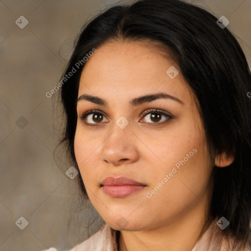 Joyful latino young-adult female with long  brown hair and brown eyes