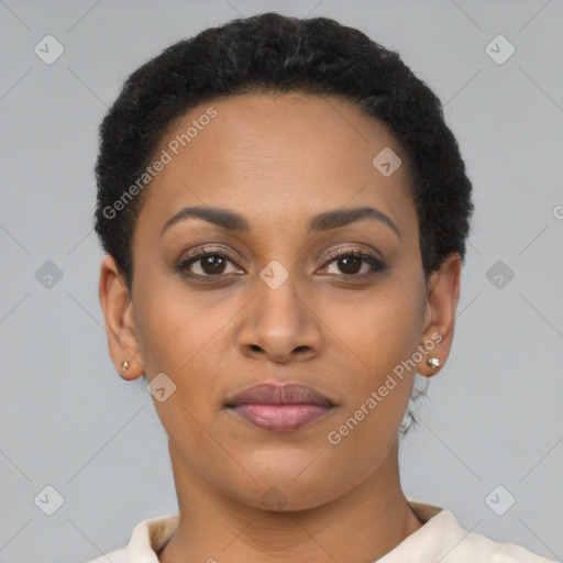 Joyful black young-adult female with short  brown hair and brown eyes