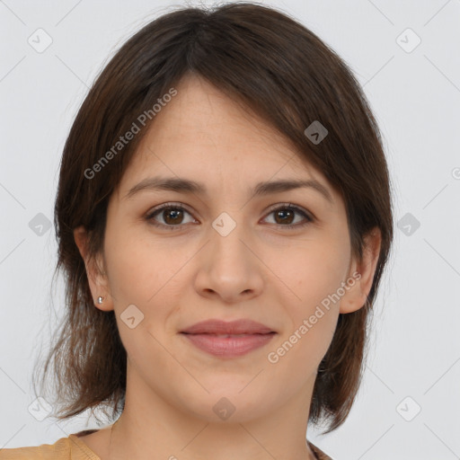 Joyful white young-adult female with medium  brown hair and brown eyes