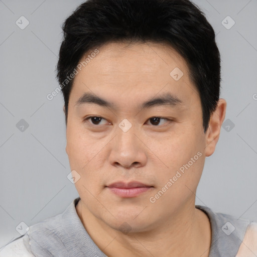 Neutral asian young-adult male with short  black hair and brown eyes