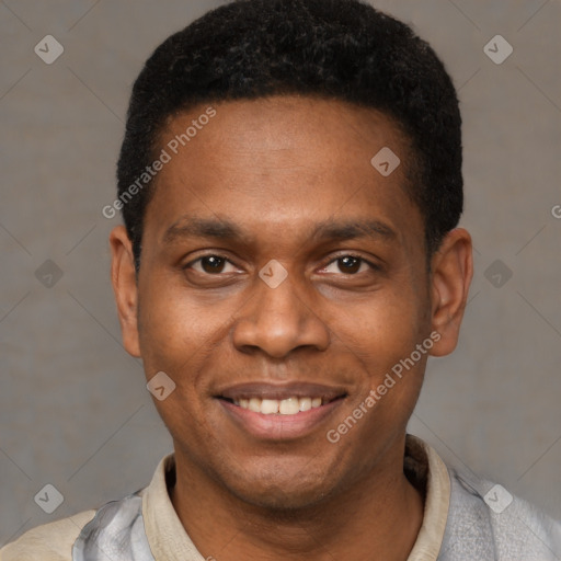 Joyful latino young-adult male with short  brown hair and brown eyes