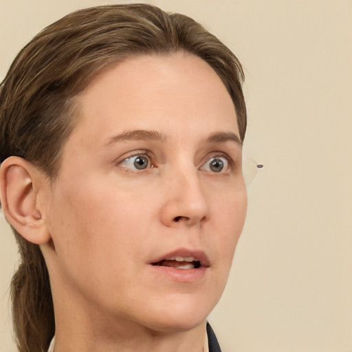 Neutral white young-adult female with medium  brown hair and grey eyes