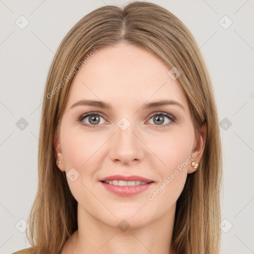 Joyful white young-adult female with long  brown hair and green eyes