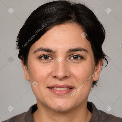 Joyful white adult female with medium  brown hair and brown eyes