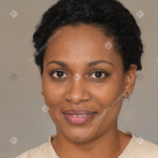 Joyful black young-adult female with short  brown hair and brown eyes