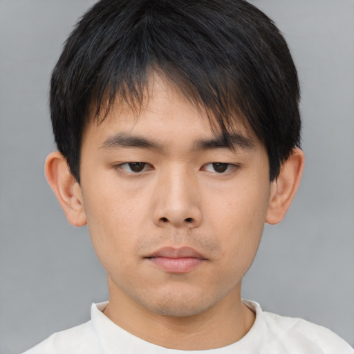 Neutral asian young-adult male with short  brown hair and brown eyes