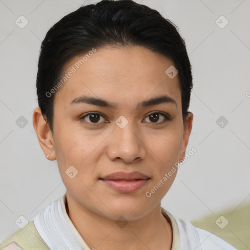 Joyful latino young-adult female with short  black hair and brown eyes