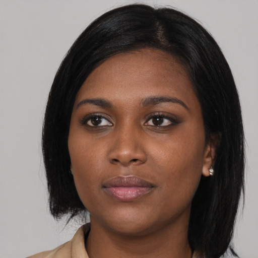 Joyful asian young-adult female with medium  black hair and brown eyes