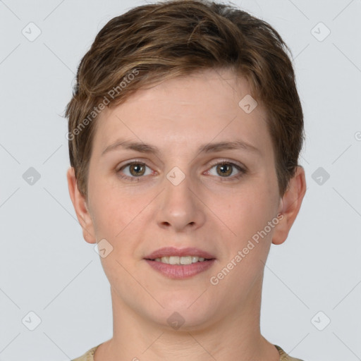 Joyful white young-adult female with short  brown hair and grey eyes