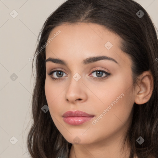 Neutral white young-adult female with long  brown hair and brown eyes