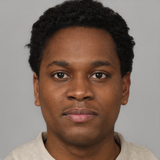 Neutral black young-adult male with short  brown hair and brown eyes