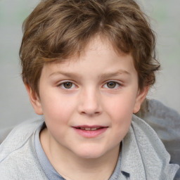 Joyful white child female with medium  brown hair and grey eyes