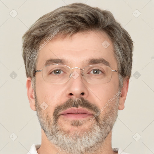 Neutral white adult male with short  brown hair and brown eyes