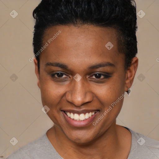 Joyful black young-adult female with short  black hair and brown eyes