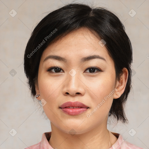 Joyful asian young-adult female with medium  black hair and brown eyes