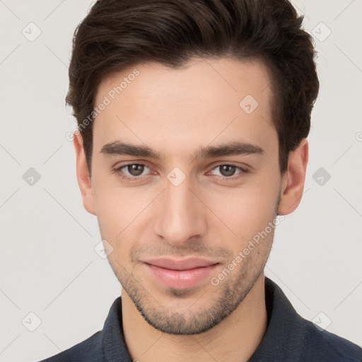 Joyful white young-adult male with short  brown hair and brown eyes