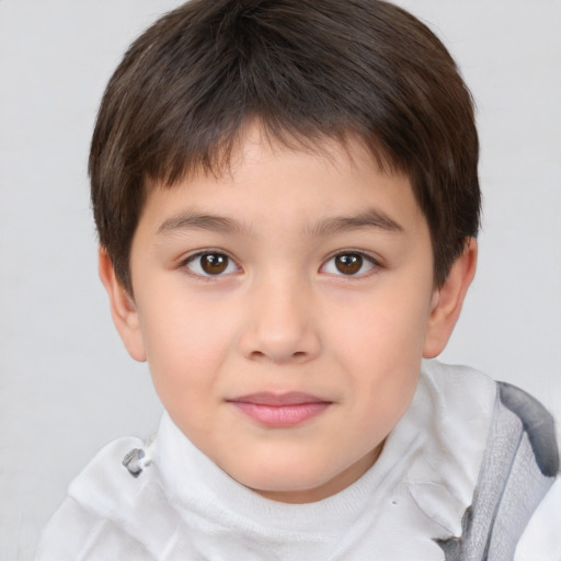 Joyful white child male with short  brown hair and brown eyes