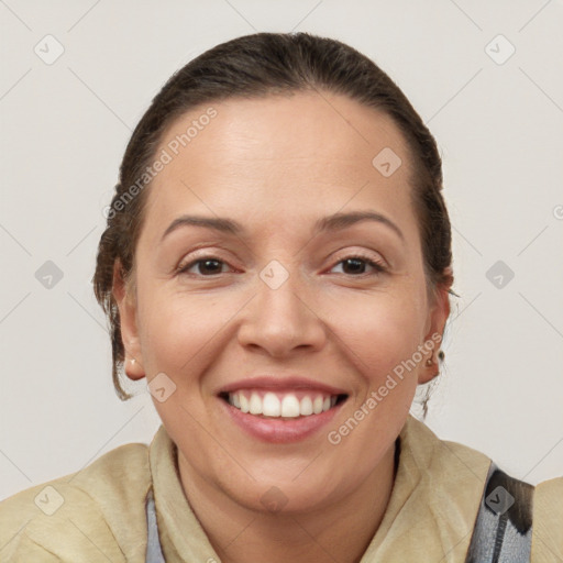 Joyful white adult female with medium  brown hair and brown eyes