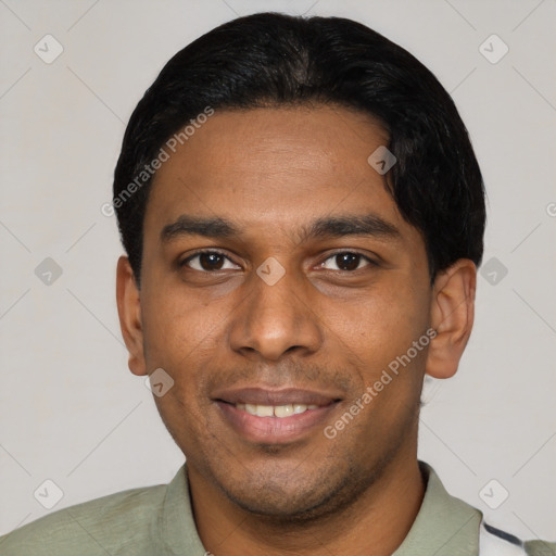 Joyful latino young-adult male with short  black hair and brown eyes