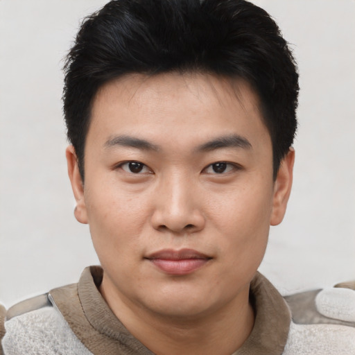 Neutral asian young-adult male with short  black hair and brown eyes