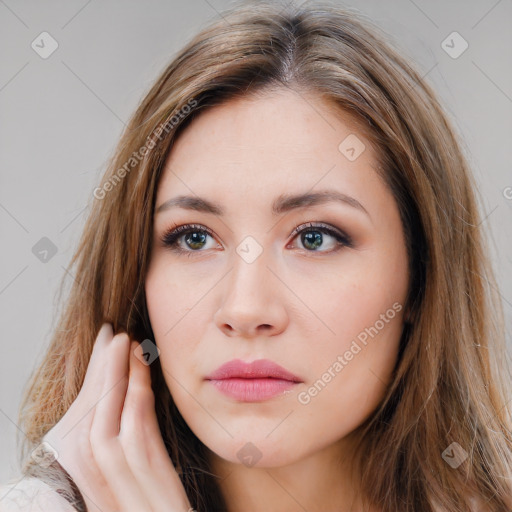 Neutral white young-adult female with long  brown hair and brown eyes