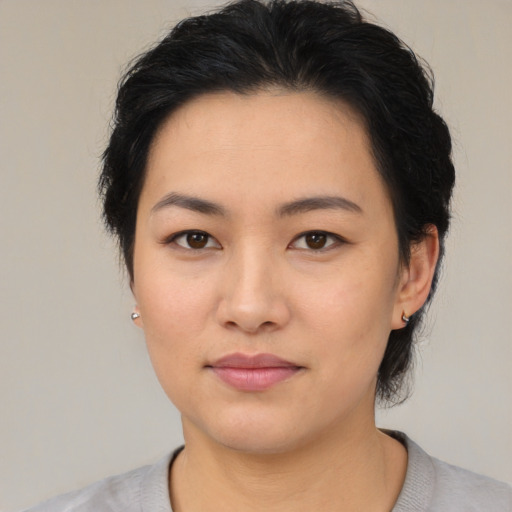 Neutral asian young-adult female with medium  black hair and brown eyes
