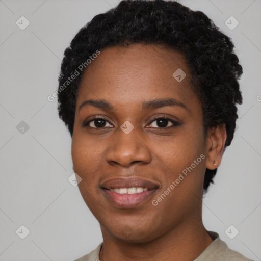 Joyful black young-adult female with short  black hair and brown eyes