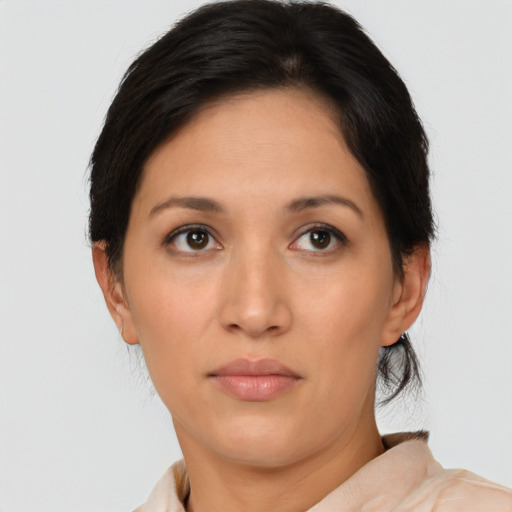 Neutral latino young-adult female with medium  brown hair and brown eyes