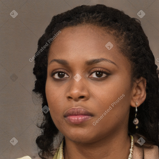 Neutral black young-adult female with long  black hair and brown eyes