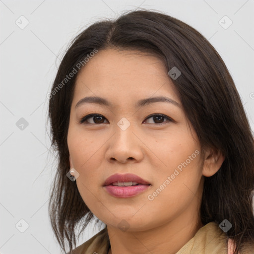 Joyful asian young-adult female with medium  brown hair and brown eyes