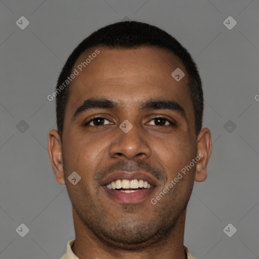 Joyful black young-adult male with short  brown hair and brown eyes