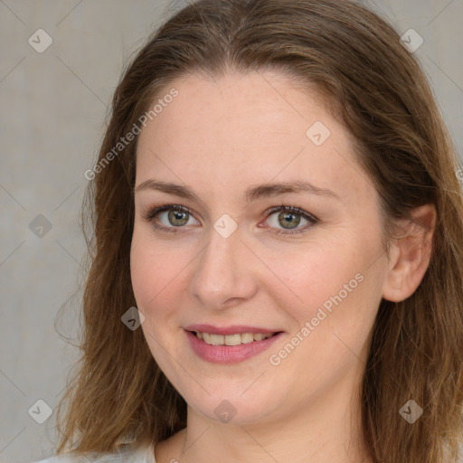 Joyful white young-adult female with medium  brown hair and green eyes