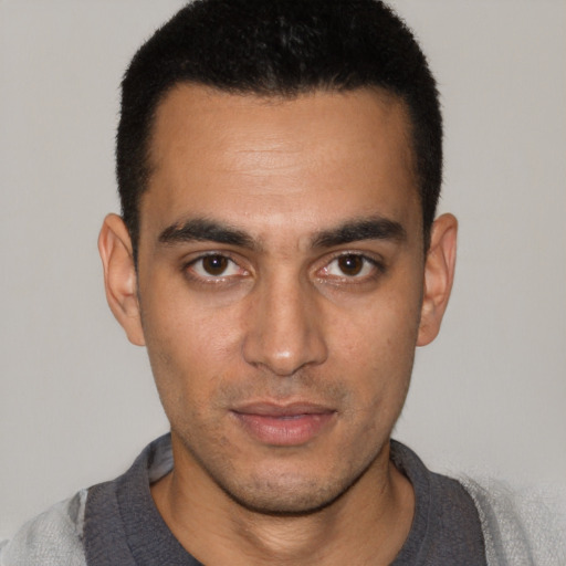 Neutral white young-adult male with short  black hair and brown eyes