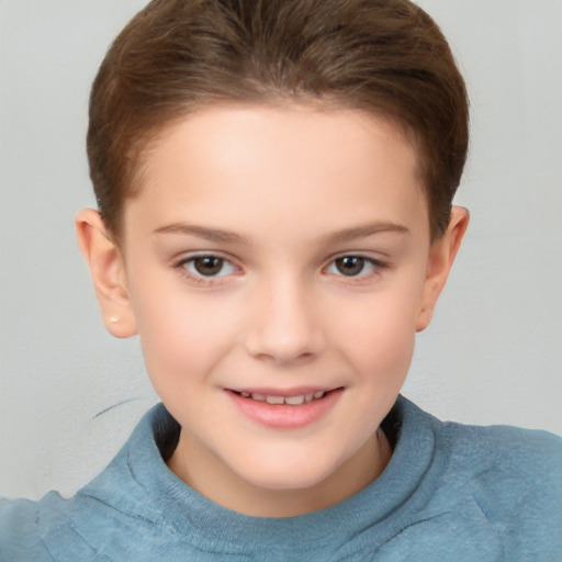 Joyful white child female with short  brown hair and brown eyes