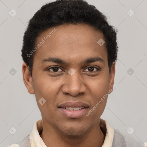 Joyful black young-adult male with short  brown hair and brown eyes