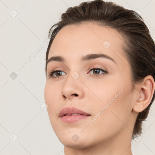 Neutral white young-adult female with medium  brown hair and brown eyes