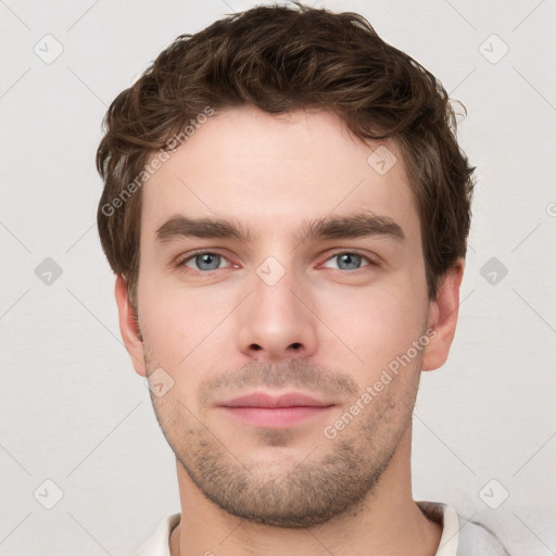 Neutral white young-adult male with short  brown hair and grey eyes