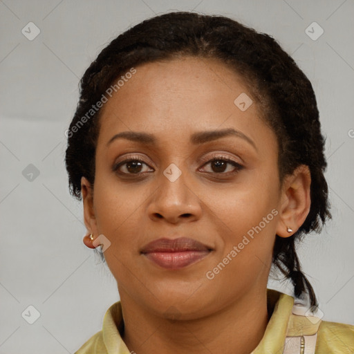 Joyful black young-adult female with medium  brown hair and brown eyes