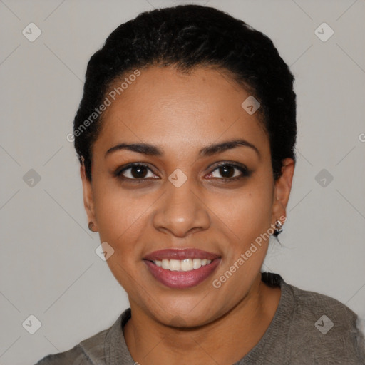 Joyful black young-adult female with short  black hair and brown eyes