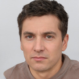 Neutral white adult male with short  brown hair and brown eyes