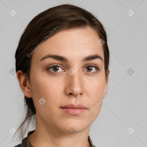 Neutral white young-adult female with medium  brown hair and brown eyes