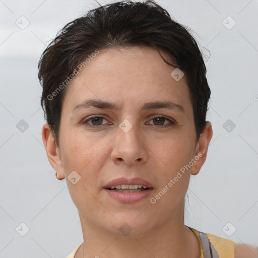 Joyful white young-adult female with short  brown hair and brown eyes