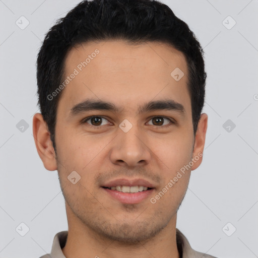 Joyful latino young-adult male with short  brown hair and brown eyes