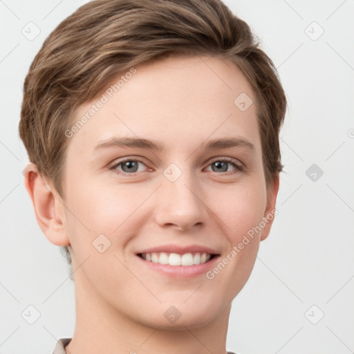 Joyful white young-adult female with short  brown hair and grey eyes