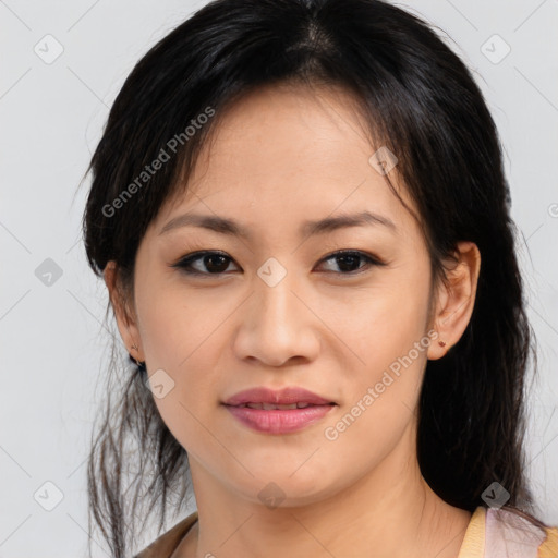 Joyful asian young-adult female with medium  brown hair and brown eyes