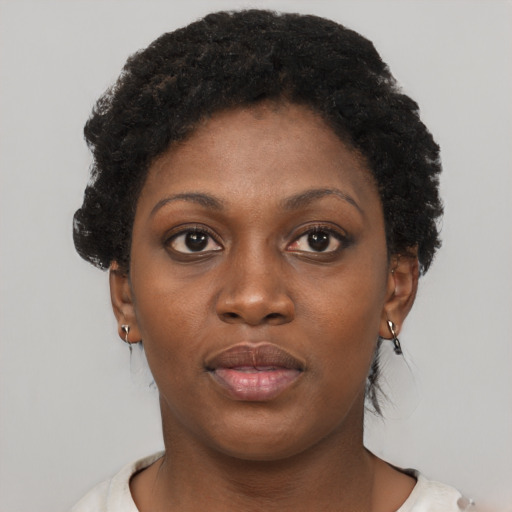 Neutral black young-adult female with short  brown hair and brown eyes