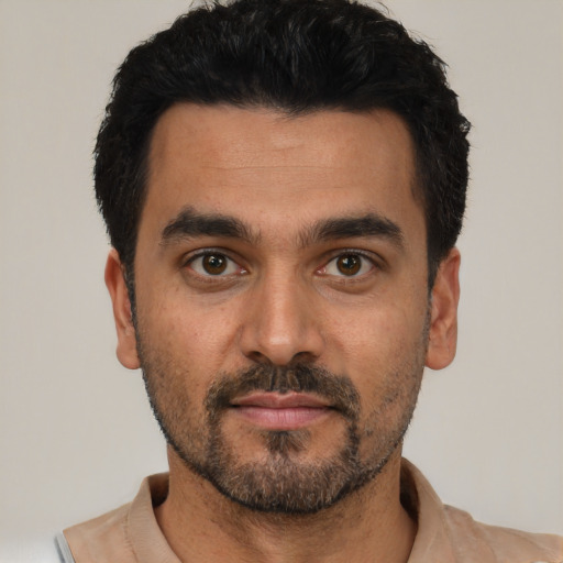 Neutral latino young-adult male with short  black hair and brown eyes