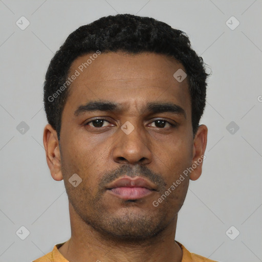 Neutral latino young-adult male with short  black hair and brown eyes