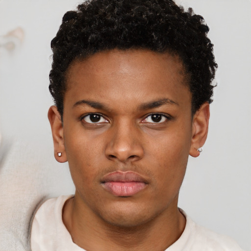 Neutral black young-adult male with short  brown hair and brown eyes