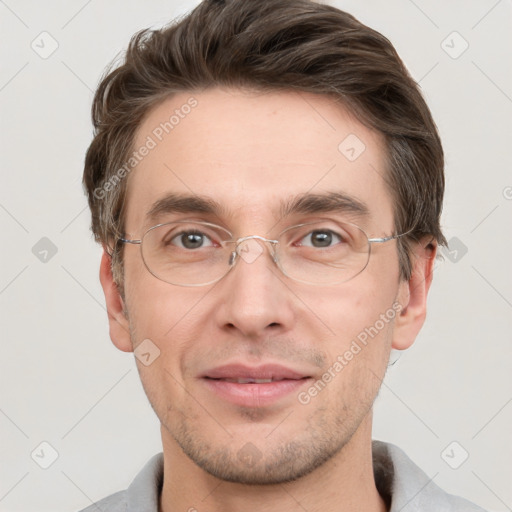 Joyful white adult male with short  brown hair and grey eyes